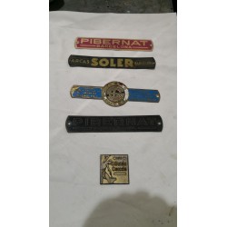 PLACAS Y ESCUDOS DE LAS MARCAS USADOS DE ALQUILER